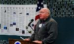 Michael A. Quigley speaks at the dedication ceremonies